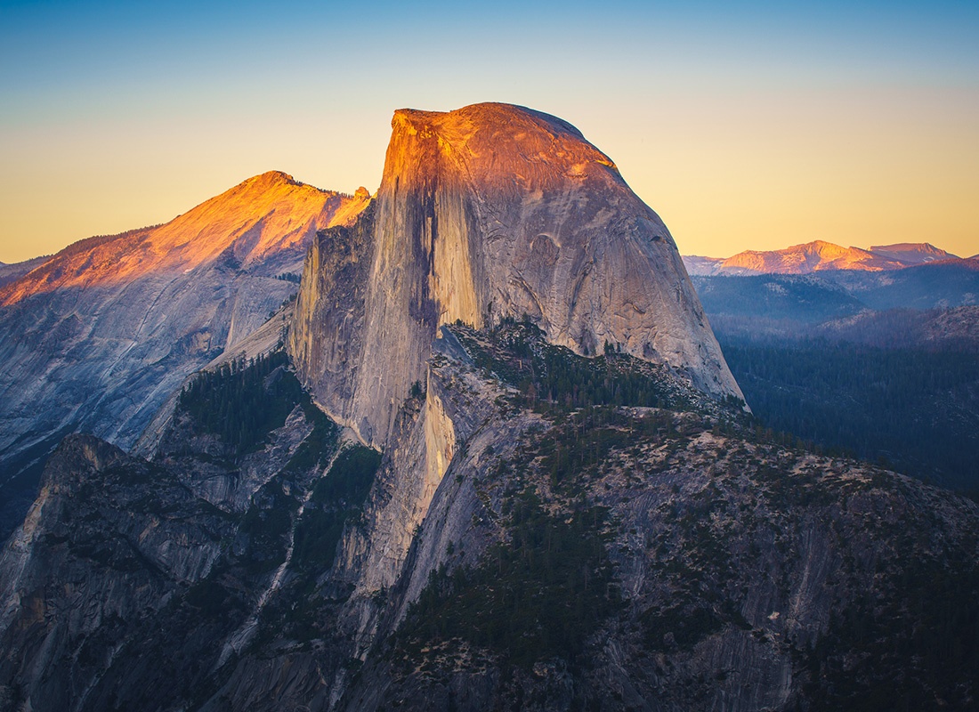 About Our Agency - Aerial View of Half Dome From Glacier Point in Yosemite National Park